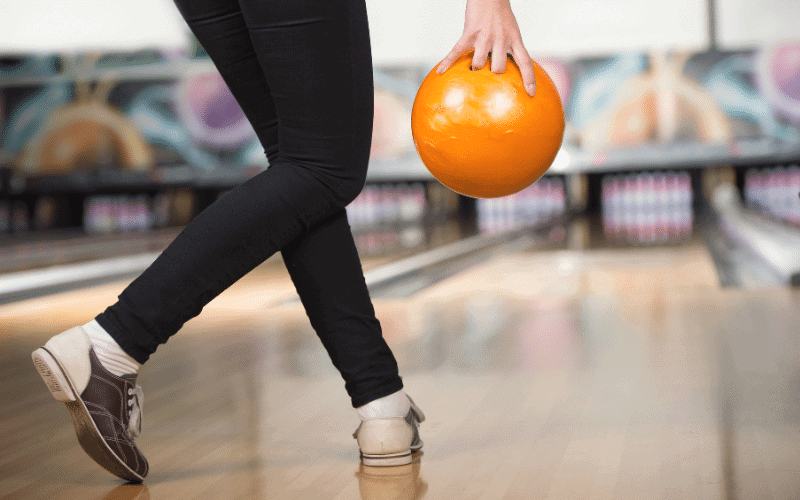 A bowler using advanced techniques and strategies to follow beginner bowling rules